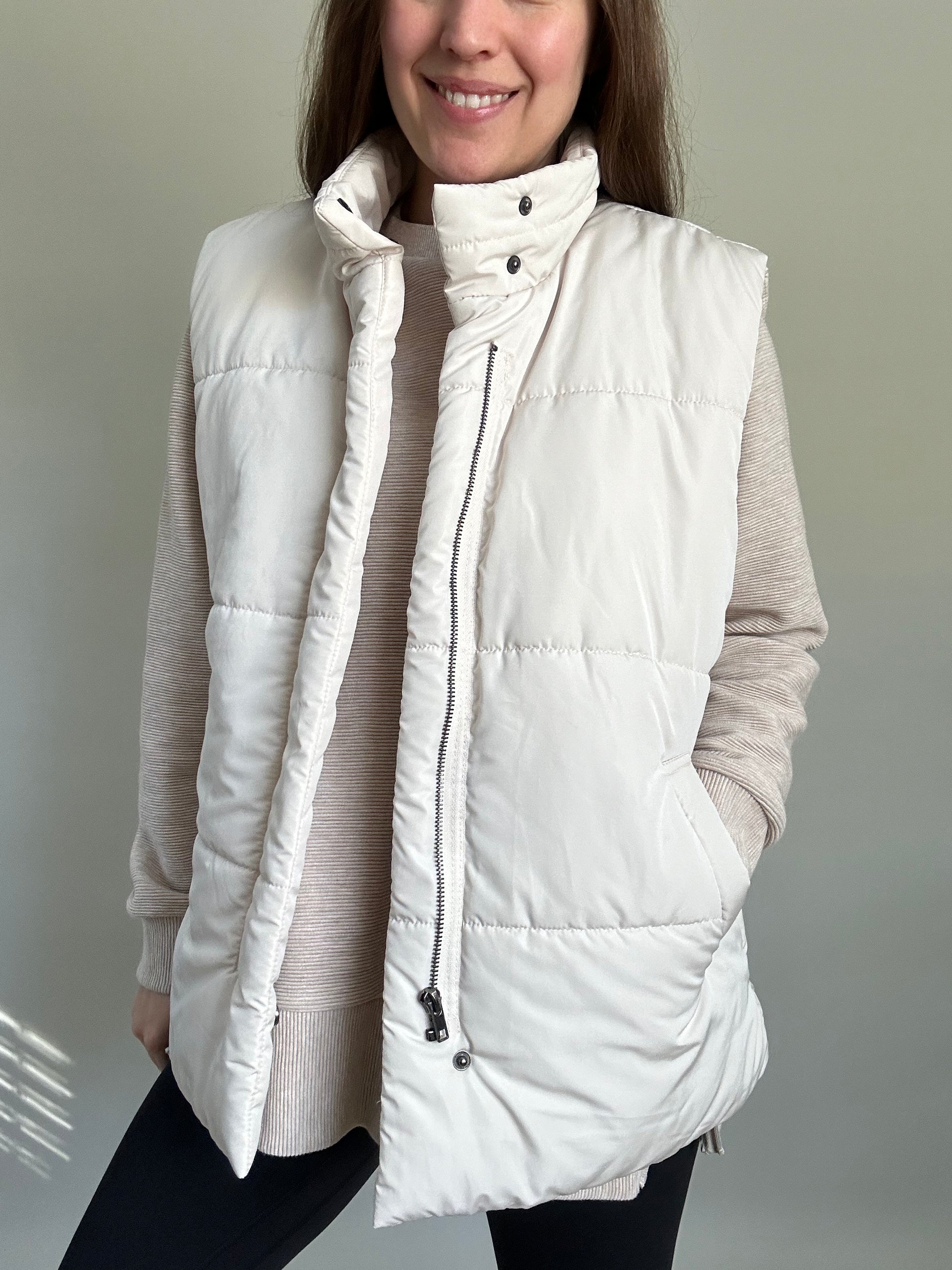 Textured Pullover with Side Zips paired with an ivory puffer vest with pockets