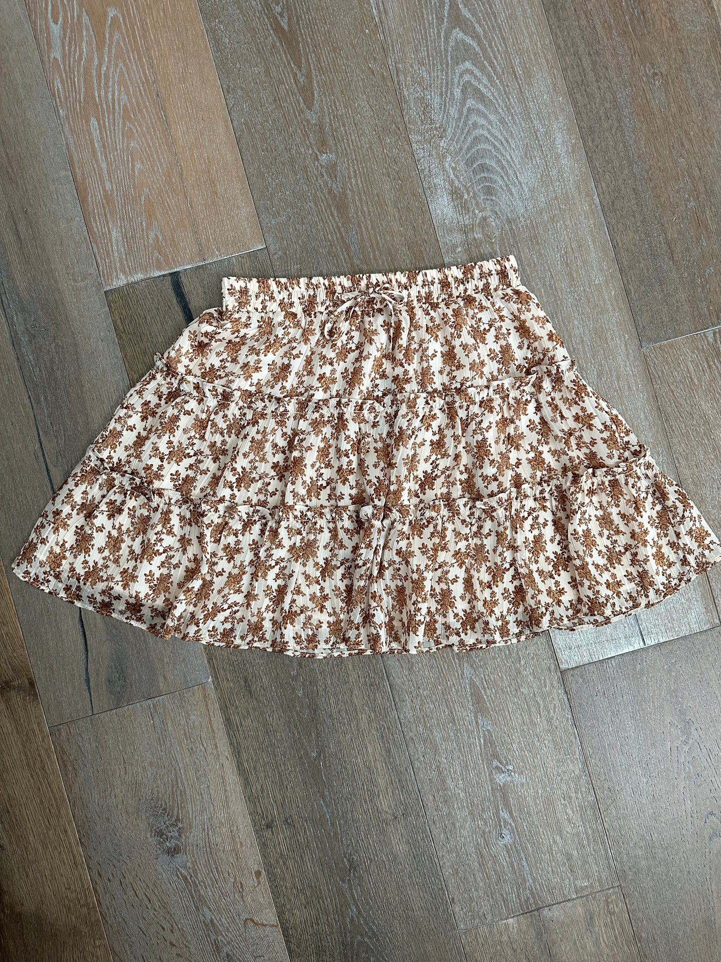Jessa Ruffle Short 3 tiered Skirt. Brown floral on white background
