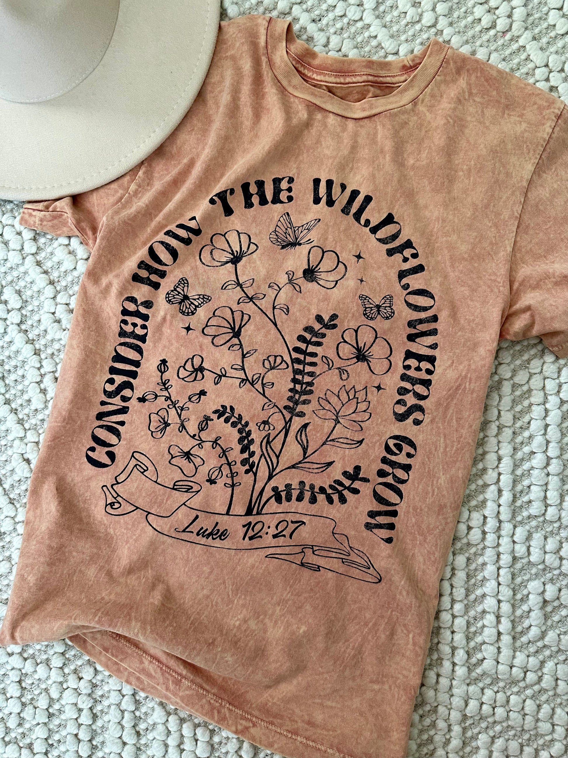 'Consider how the wildflowers grow', Luke 12:27 coral mineral washed graphic tee